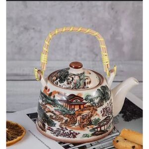 Chinese ceramic tea pot with strainer